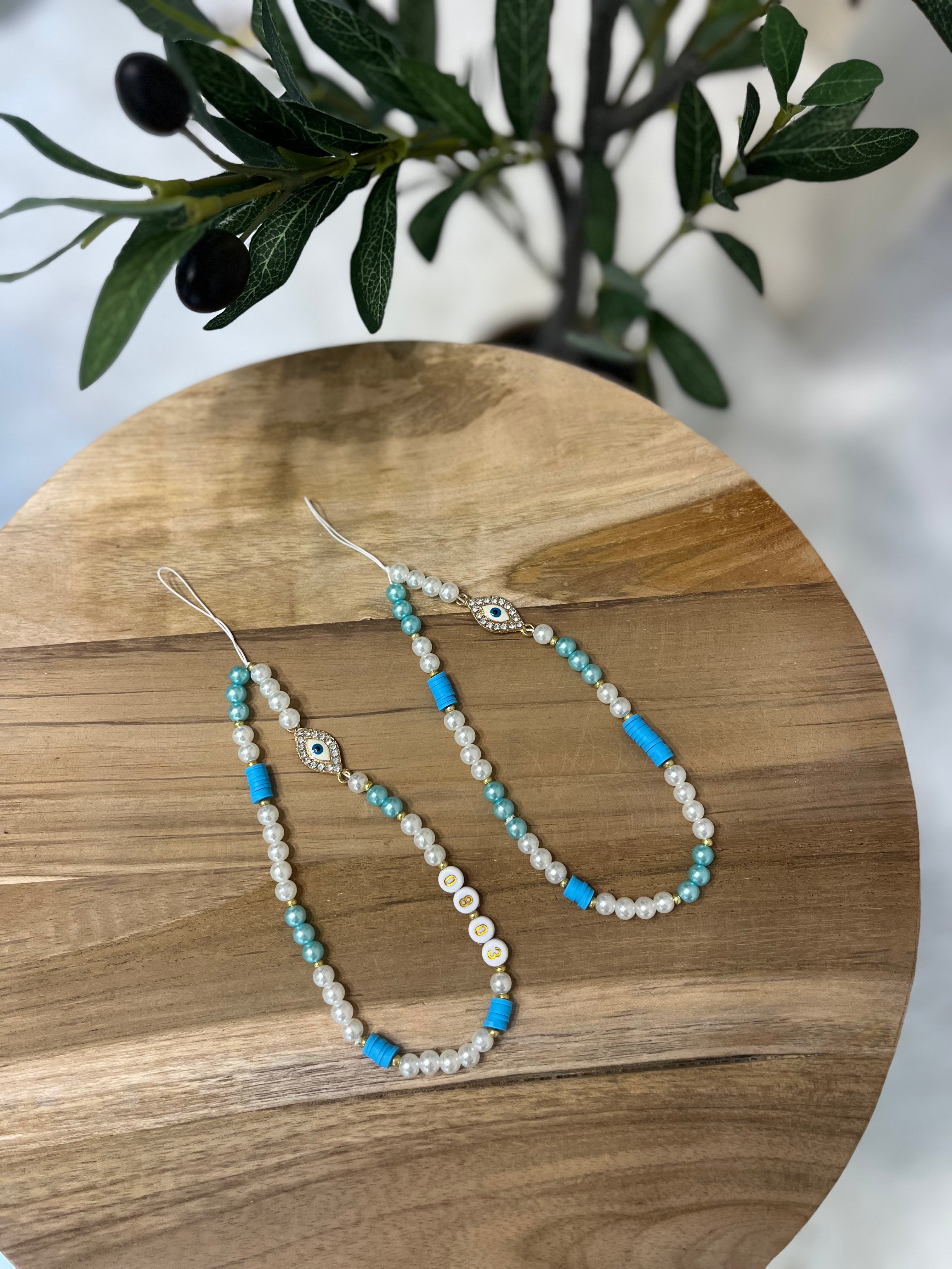 Grigri de téléphone personnalisé EYES